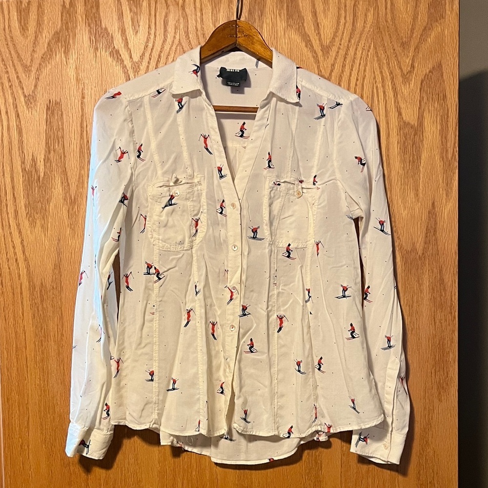 Maeve White Shirt with Red and Blue Skiers